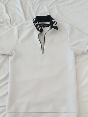 MAUVAIS | Men's White Quarter Zip Polo with Black Logo Collar